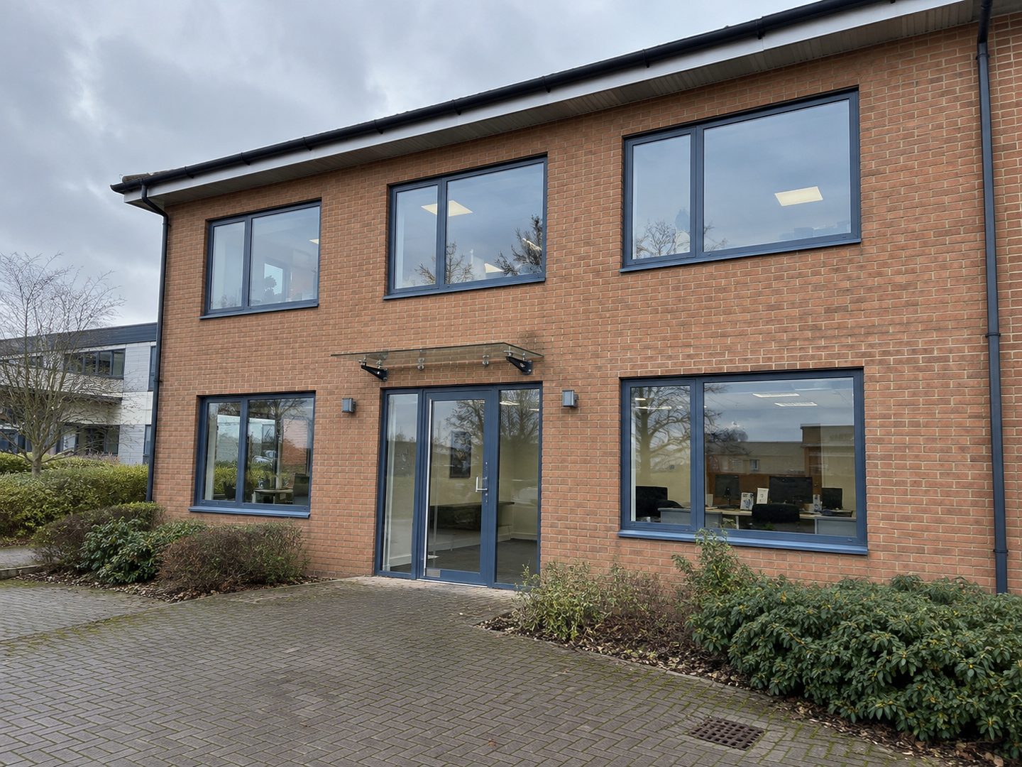 Brick office building with every window cleaned front and side